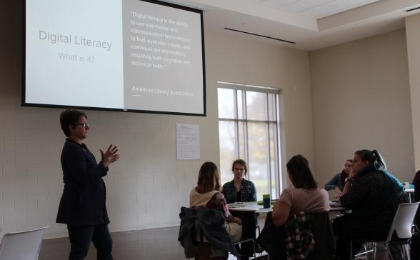 Woman presenting about digital literacy