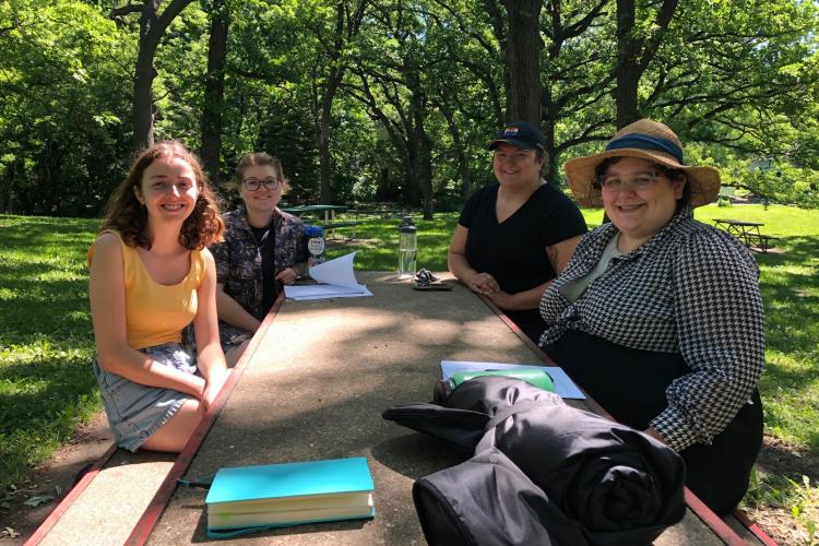 CTEP members of senior instruction group meeting outside to plan final project details. From left to right: Grace Clark, Tabitha Duggan, Ally Ososki and Devon Matti.